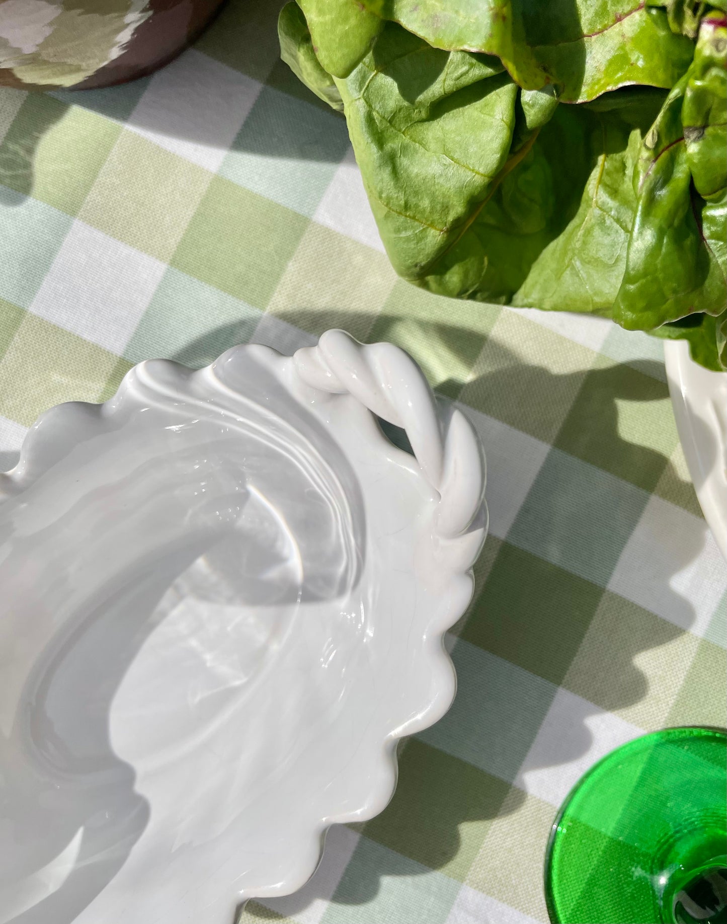White ceramic scalloped edge basket